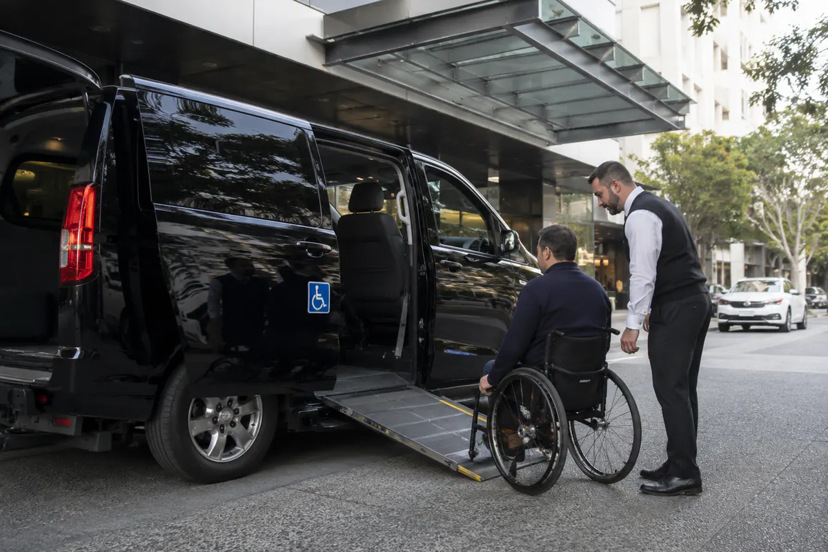 Wheelchair-accessible van with ramp deployed